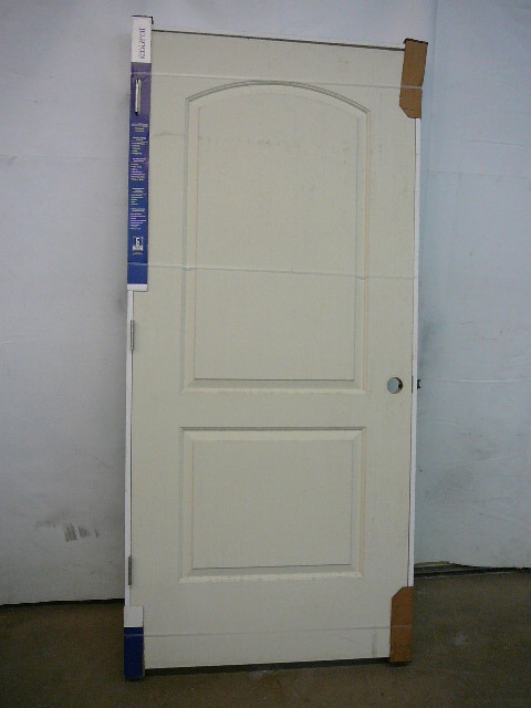 lot 10 image: Molded 2 Panel Smooth Door