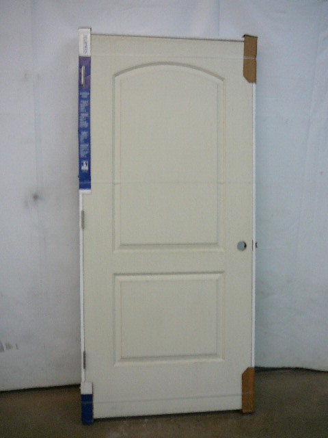 lot 11 image: Molded 2 Panel Smooth Door