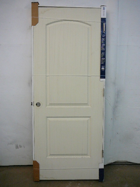 lot 12 image: Molded 2 Panel Smooth Door