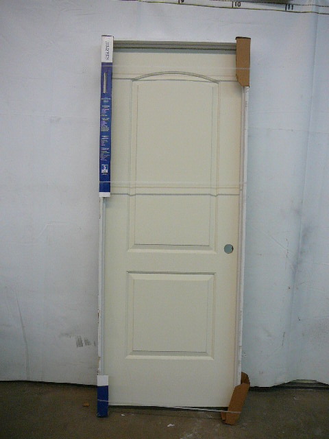 lot 69 image: Molded 2 Panel Arch Top Smooth Door
