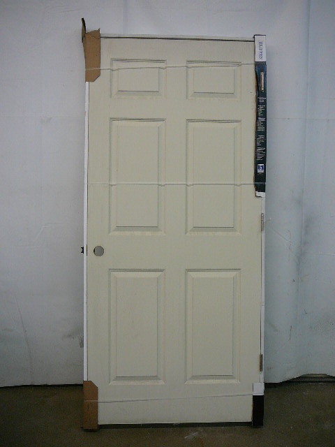 lot 70 image: Molded 6 Panel Textured Door