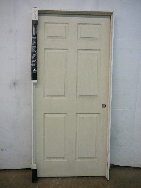 lot 73 image: Molded 6 Panel Textured Door