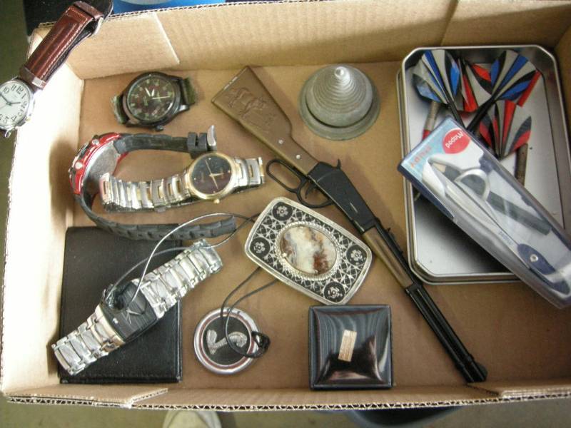 lot 19 image: Watches, Wallet, Cap Gun, Belt Buckle