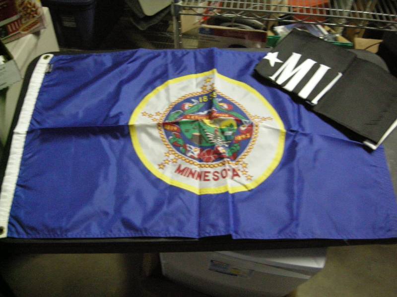 lot 72 image: Minnesota State Flag and POW-MIA Flag