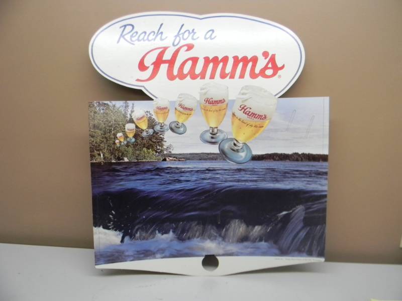 lot 43 image: HAMMS BEER FLYING GOBLET CARDBOARD SIGN - RARE HARD TO FIND SIGN - APPROX 23 BY 25 - SEE PICTURES