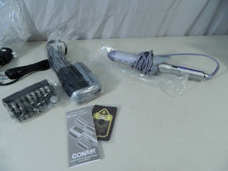 lot 32 image: New John Frieda Curling Iron and New Ionic Styler