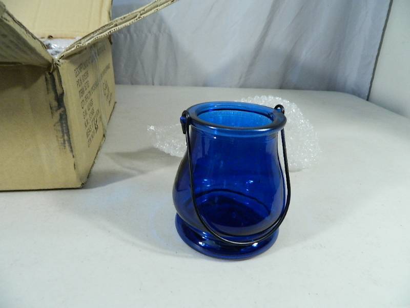 lot 53 image: 12 New Colored Glass Tealight Lanterns