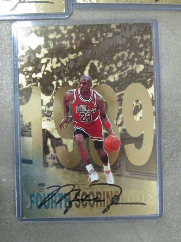 lot 52 image: 8 Upper Deck Gatorade Michael Jorda...