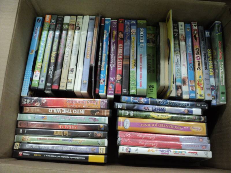 box of 50 Pg 13 DVDS...