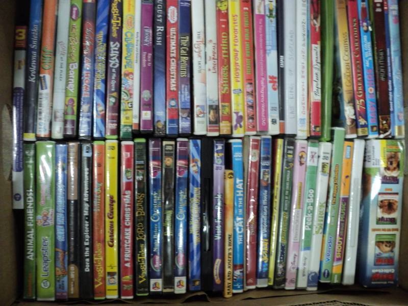 Box of 60 DVDs and 80 CDs...