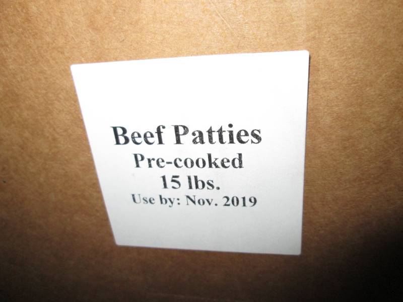 15 Pound Case of Beef Patties, pre cooked, dated Dec. 2019