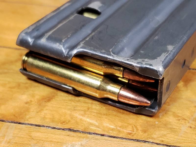 lot 4 image: 30 Capacity Metal Clip Filled with (30) .223 Hornady Ammo