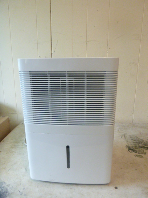 lot 12 image: GE Dehumidifier