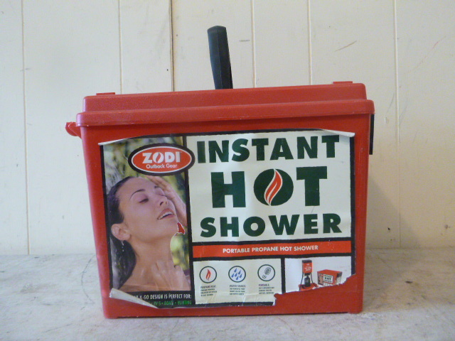lot 13 image: Zodi Outback Gear Instant Hot Shower