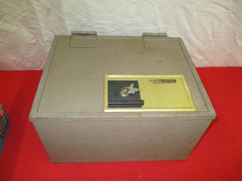 lot 37 image: Fireproof insulated safe with keys 16 x 12 12