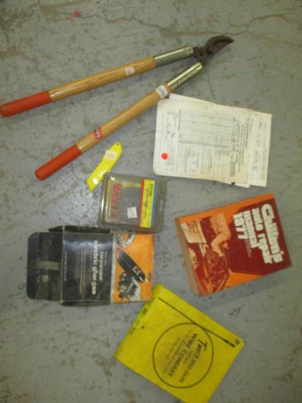 lot 179 image: Repair Manual, Utility Knife, Pruner, and Distributer Cap