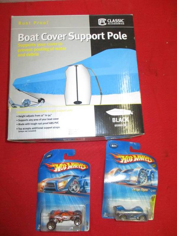 lot 182 image: Boat Cover Support Pole and 2  Hot Wheels