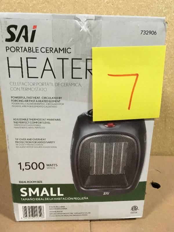 lot 7 image: 1,500-Watt Convection Electric Portable Heater and Fan  in like new condition