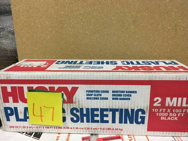 lot 47 image: HUSKY 10 ft. x 100 ft. Black 2 mil Plastic Sheeting  in like new condition
