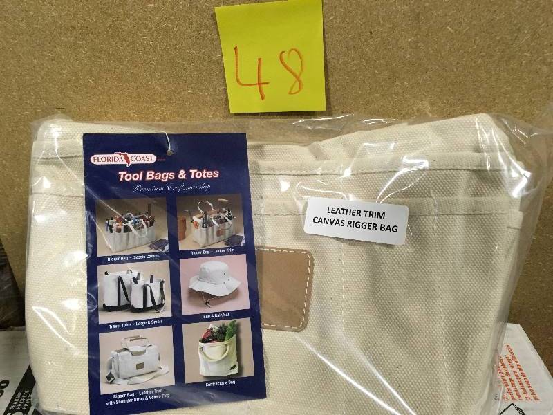 lot 48 image: LEATHER TRIM CANVAS RIGGER BAG  in like new condition