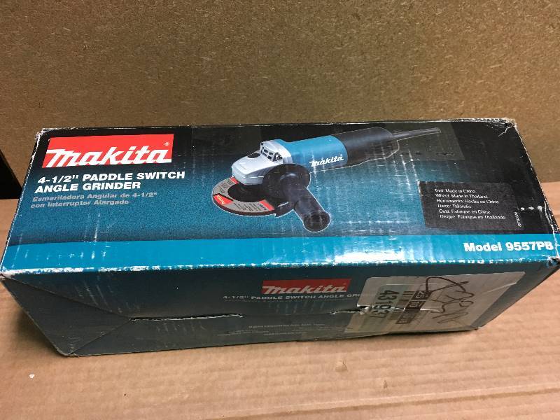 lot 66 image: Makita 7.5 Amp 4-12 in. Paddle Switch Angle Grinder  in like new condition