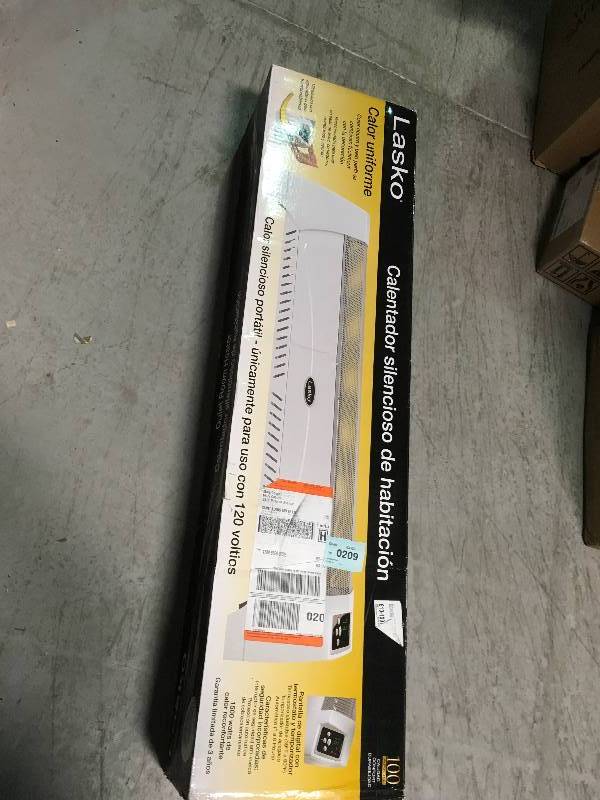 Lasko 1,500-Watt Low Profile Silent Room Heater with Digital Display, White in like new condition