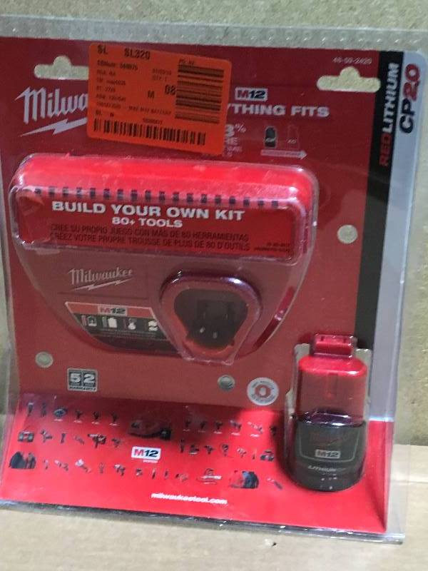Milwaukee M12 12-Volt Lithium-Ion Compact Battery Pack 2.0Ah and Charger Starter Kit in like new condition