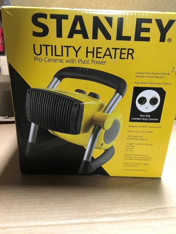 lot 22 image: Stanley 1500-Watt Utility Ceramic Portable Heater with Pivot Power in like new condition