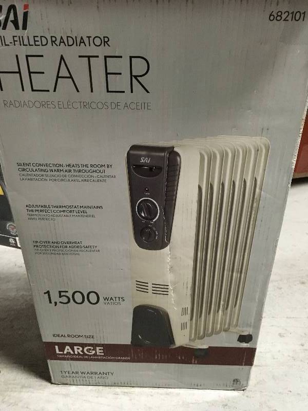 lot 27 image: 1500-Watt Electric Oil-Filled Radiant Portable Heater - Grey in like new condition