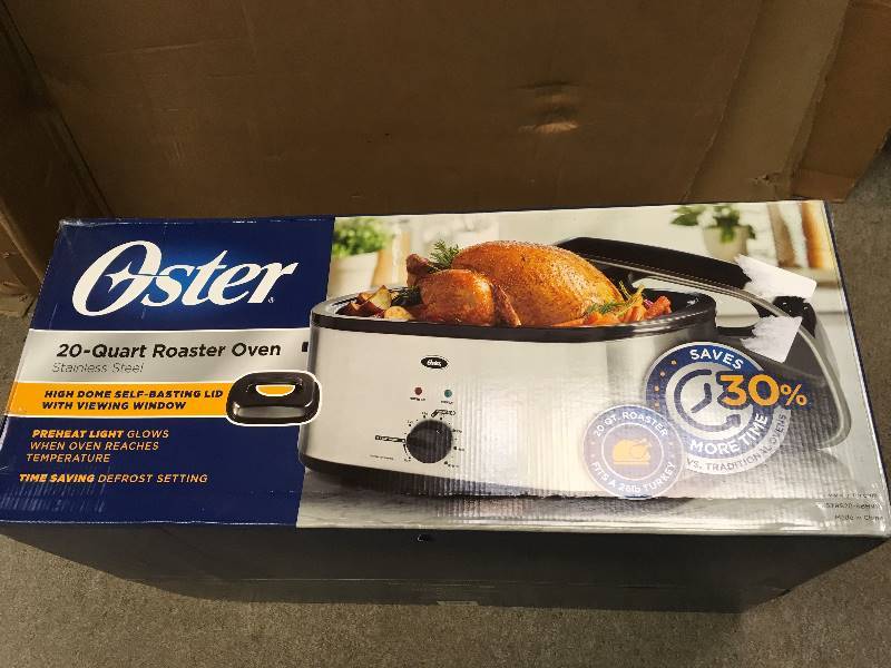 lot 66 image: Oster 20 Quart Roaster Oven - Stainless Steel and Self-Basting Lid in like new condition