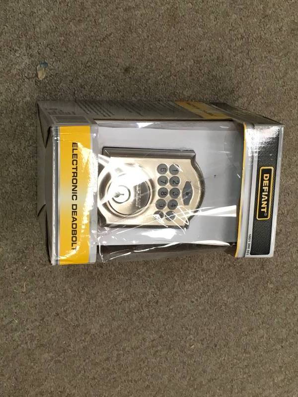 lot 78 image: Defiant Castle Satin Nickel Electronic Keypad Deadbolt in like new condition