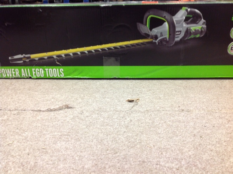 lot 104 image: EGO  56V Lithium-ion Cordless 24 in. Brushless Hedge Trimmer Kit (210W Charger, 2.5Ah Battery Included) not used