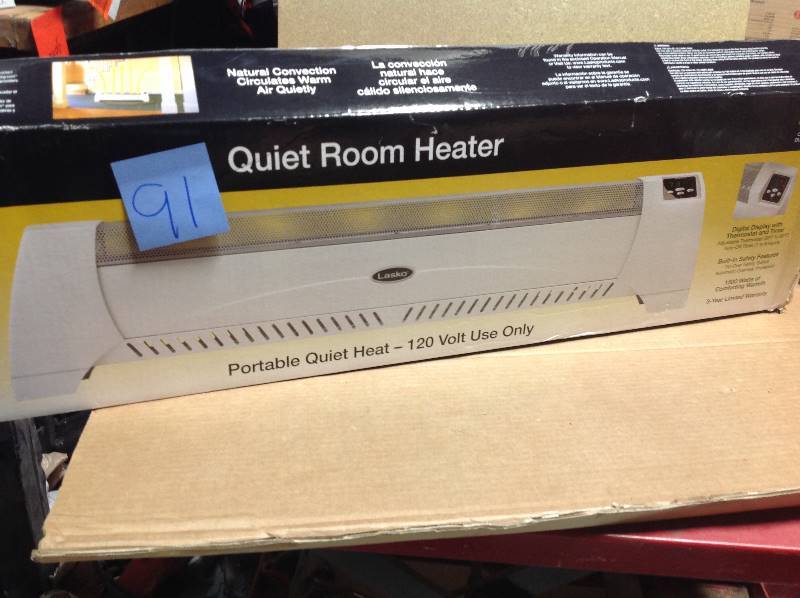 lot 91 image: Lasko 1,500-Watt Low Profile Silent Room Heater with Digital Display, White  in like new condition