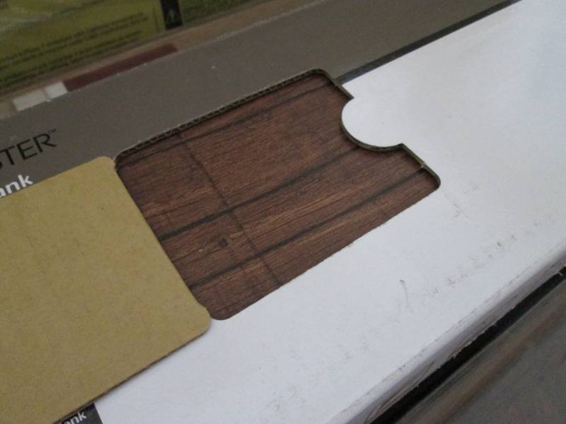 lot 5 image: 8 Cases of Traffic Master Walnut Em...
