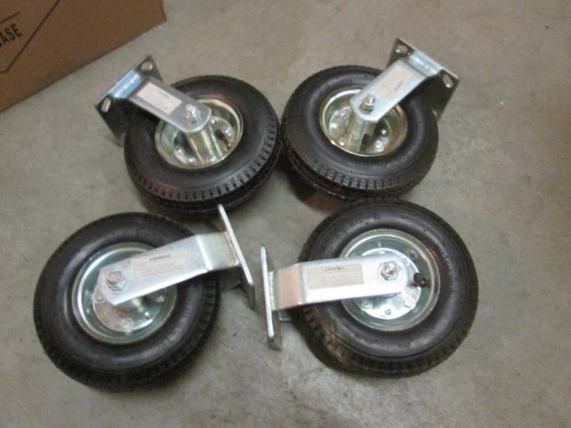 lot 17 image: Lot of 4 8 Pneumatic Rigid Casters...