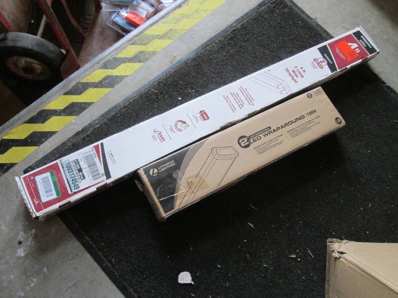 lot 82 image: Lot of 2 Light Fixtures 2 ft LED an...