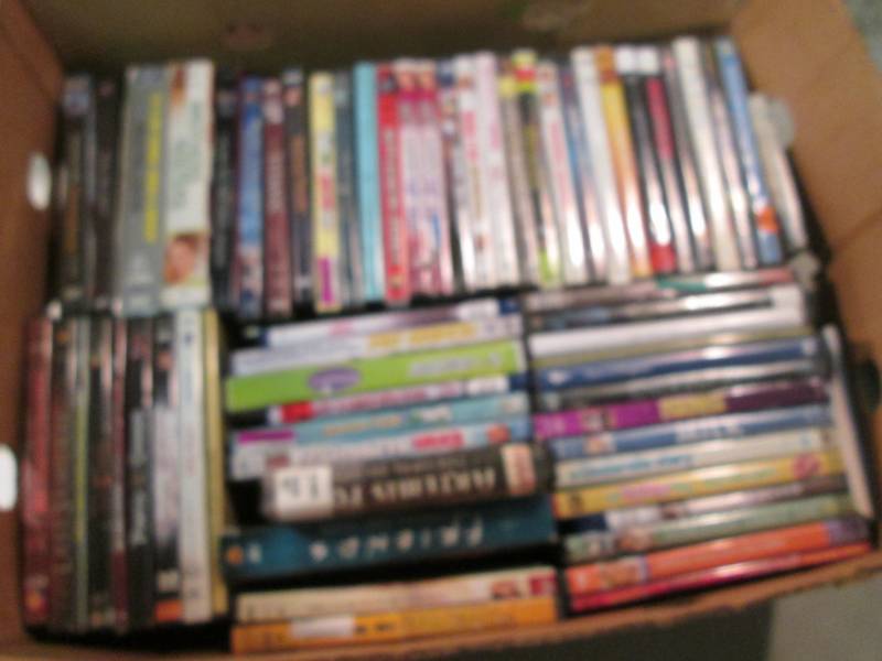 lot 103 image: Lot of 63 DVDs  RM2...