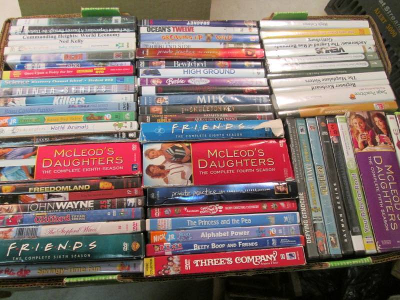 lot 104 image: Lot of 64 DVDs  D-2...
