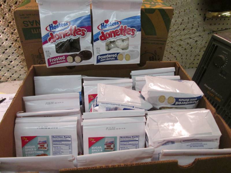 lot 214 image: Box Full of Hostess Donettes Froste...