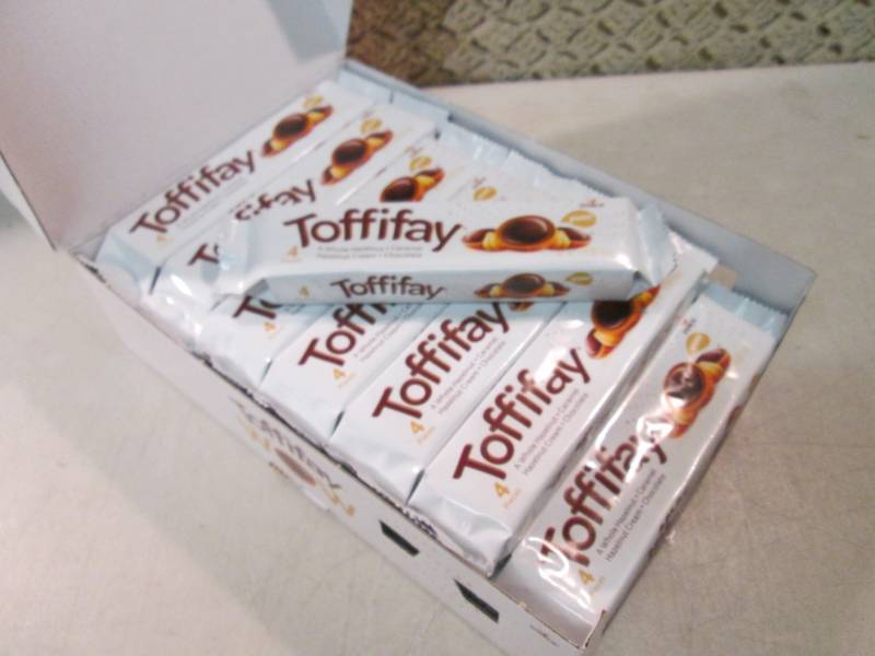 lot 218 image: Box of 21 Packs of Toffifay Candy B...