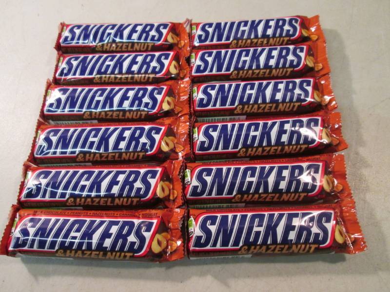 lot 272 image: 12 Snickers & Hazelnut Candy Bars B...
