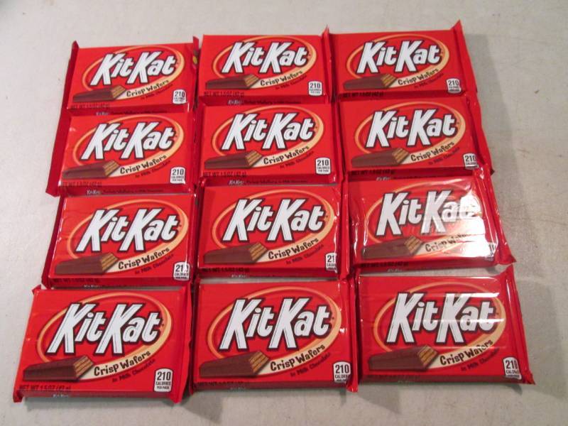 lot 273 image: 12 Kit Kat Candy Bars Best by Dec 2...