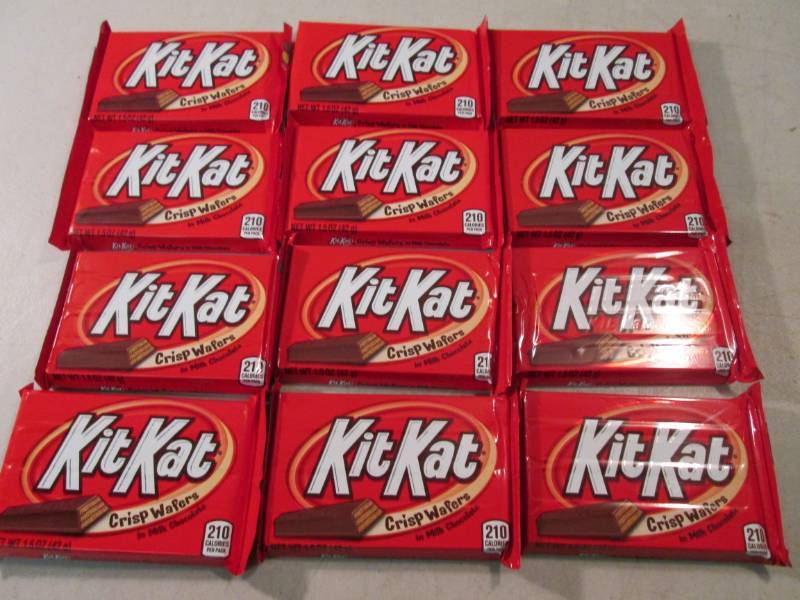 lot 274 image: 12 Kit Kat Candy Bars Best by Dec 2...