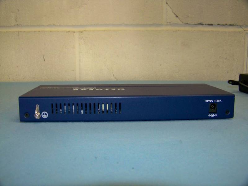 lot 46 image: NetGear, 8-Port, 10100 Mbps, ProSafe Switch with POE and Power Supply