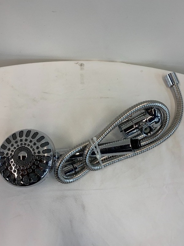 lot 11 image: WaterPik PowerSpray Gently Used