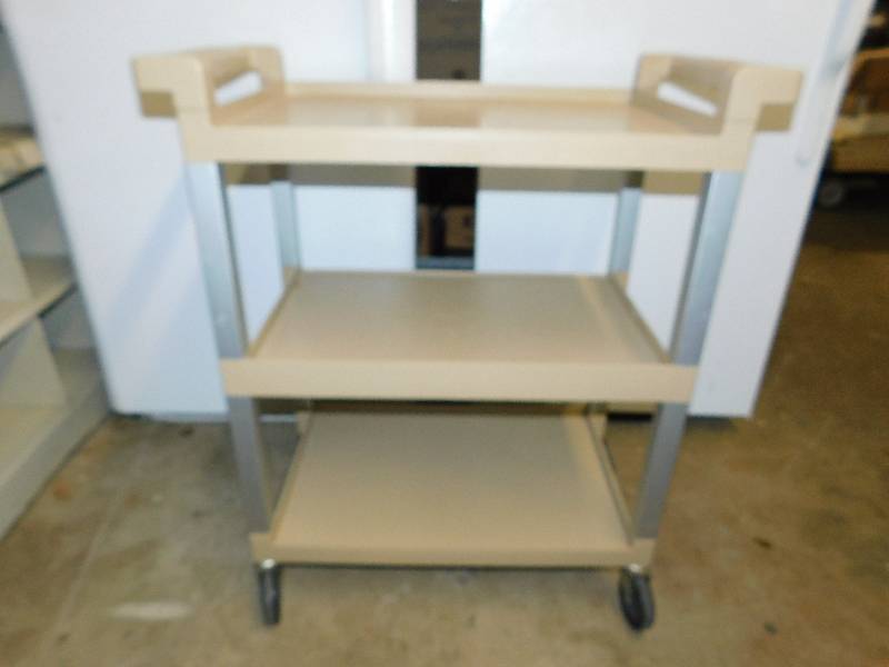 Creme Colored Rubbermaid Three Shelf Cart On Wheels