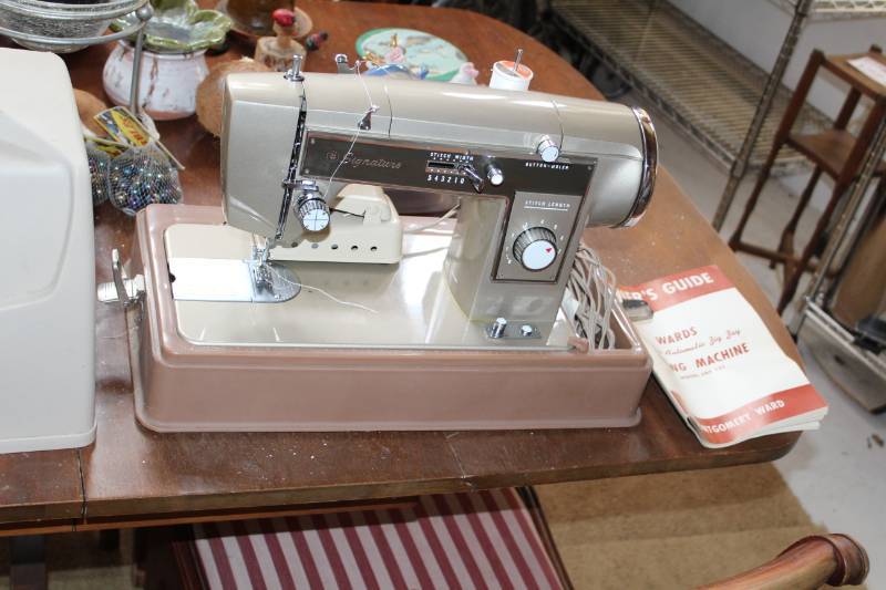 lot 202 image: Montgomery Ward 14-Cam Automatic Zig Zag Sewing Machine with Manual