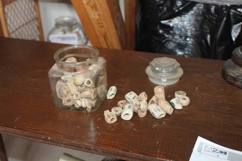 lot 244 image: Glass Jar with Wood or Ceramic Carvings