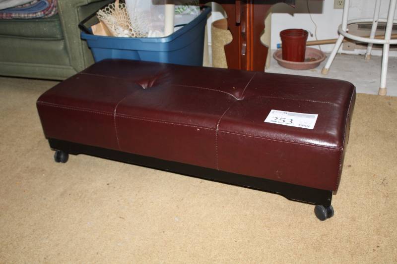 lot 253 image: Leather Rolling Ottoman