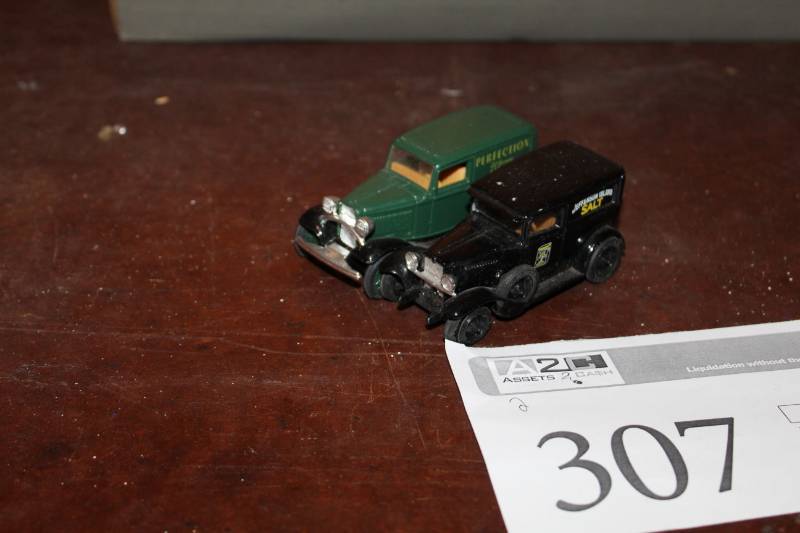 lot 307 image: Erlt Die Cast Scale Model Trucks - 1932 Ford Panel Delivery Truck with Perfection Oil Burning Stoves Livery, 1930 Chevrolet 12-Ton Delivery with Jefferson Island Salt Livery
